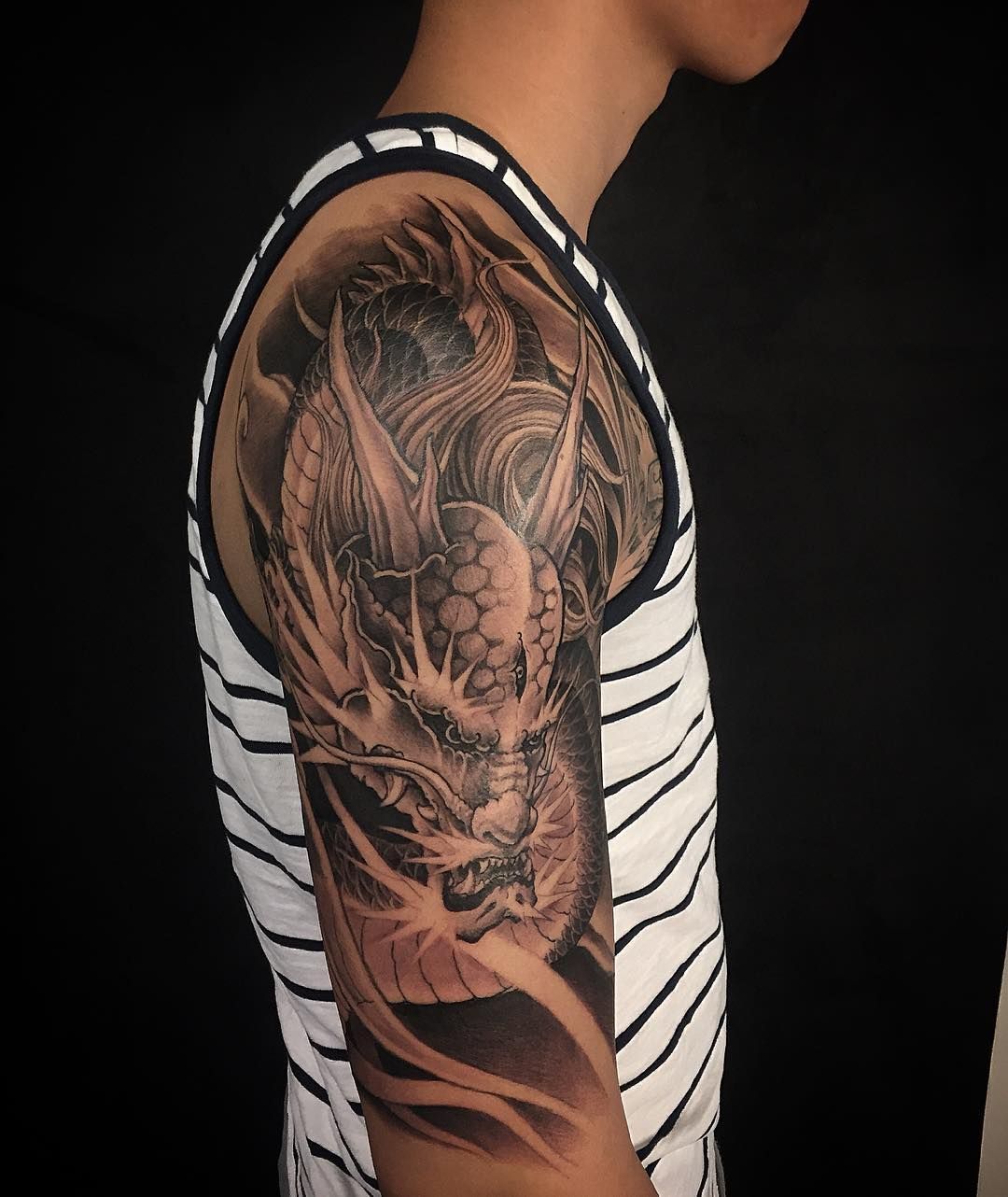Half Sleeve Tattoo With Dragon